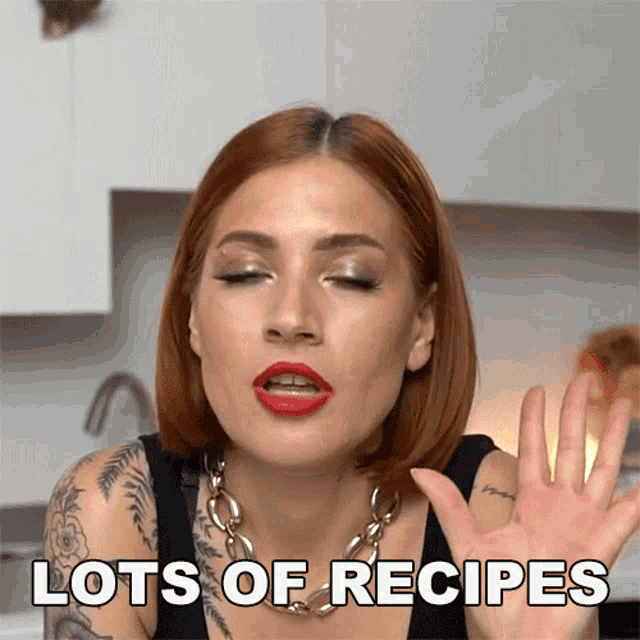 a woman says lots of recipes with her hand in the air