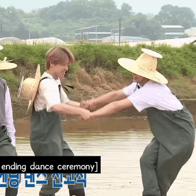 two men in overalls and straw hats shake hands in front of a river with the words ending dance ceremony written below them