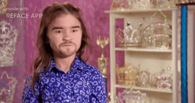 a young girl with long hair and a beard is standing in front of a shelf full of crowns .