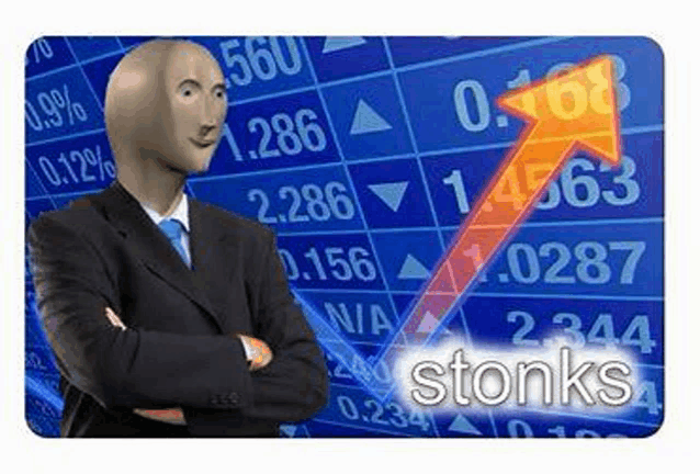 a bald man in a suit and tie is standing in front of a stock market chart .