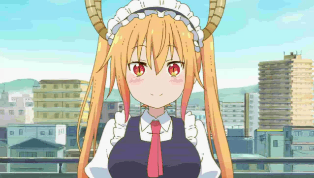 a maid with horns is standing in front of a city with buildings in the background .