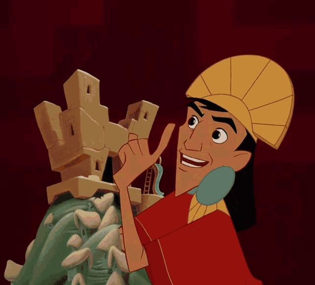 the emperor from the emperor 's new groove is smiling and pointing