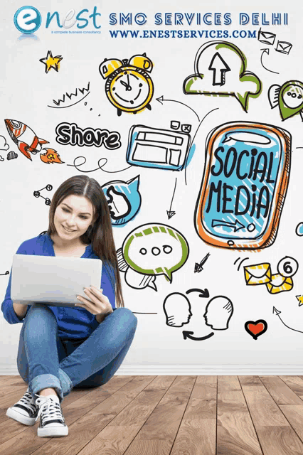 a woman sits on the floor with a laptop in front of a wall with drawings on it including one that says social media