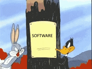 bugs bunny and daffy duck are standing next to a sign that says software