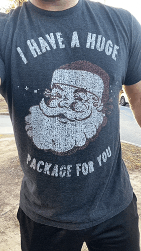 a man wearing a shirt that says i have a huge package for you