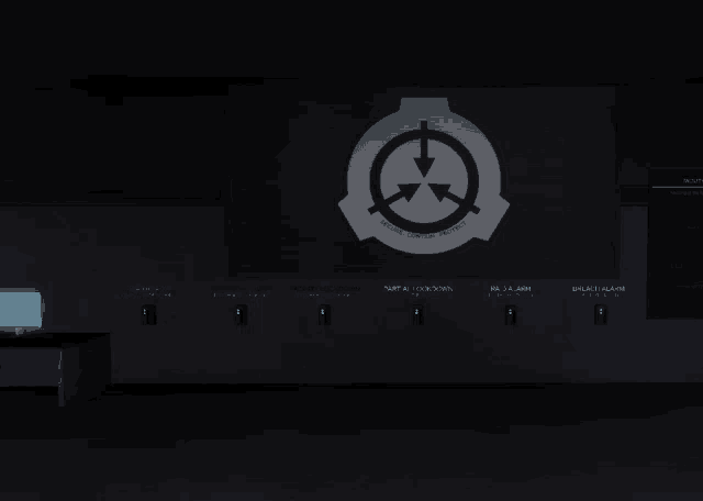 a scp logo is displayed on a screen in the dark