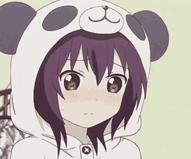 a girl with purple hair is wearing a panda costume