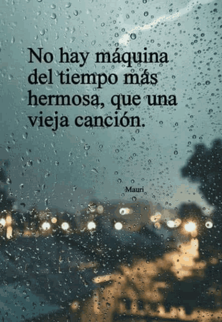 a picture of a window with a quote in spanish on it