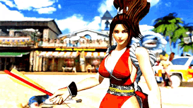 a woman in a red bikini is holding a fan in front of a building that says ' king of fighters '