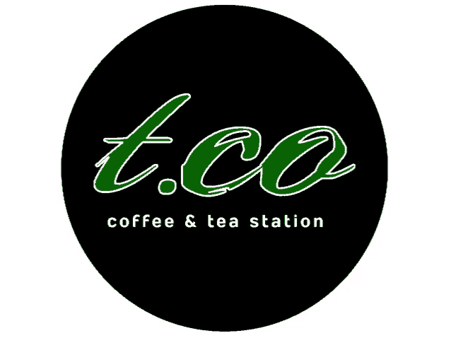 a logo for t.co coffee and tea station in a black circle