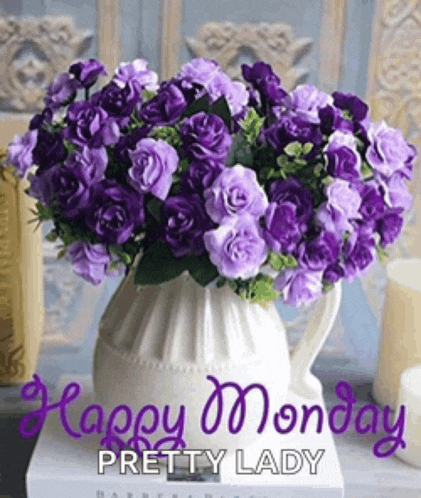 a vase filled with purple roses and the words `` happy monday pretty lady ''