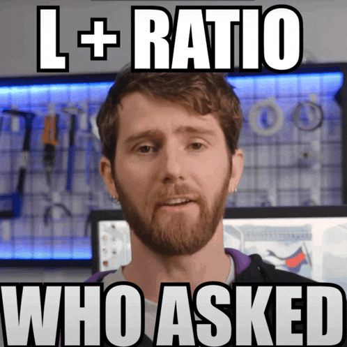 a man with a beard is standing in front of a wall with tools and the words " l + ratio who asked "