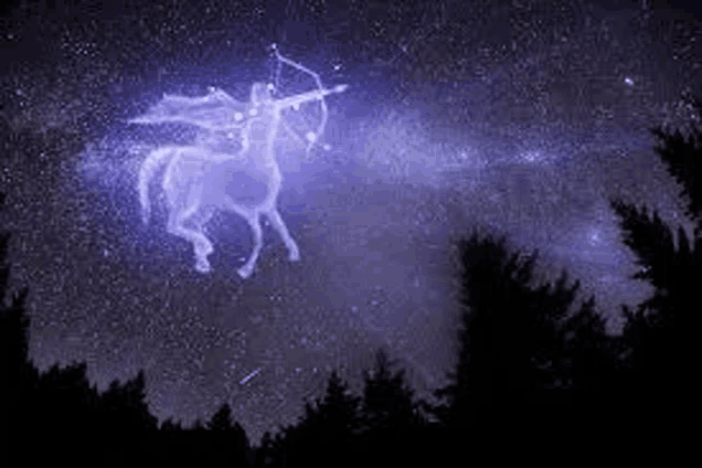 a centaur with a bow and arrow is flying through a starry night sky .