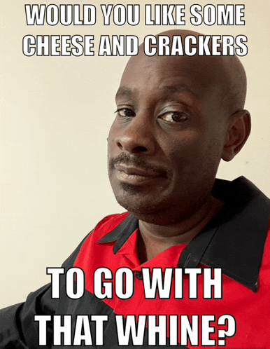 a man in a red and black shirt with a caption that says would you like some cheese and crackers to go with that whine