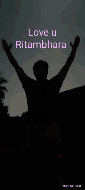 a silhouette of a man with his arms in the air with the words love u ritambharat