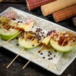 caramel apple slices on a plate