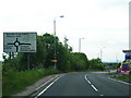 NS5373 : A809 nears the B8050 roundabout by Colin Pyle