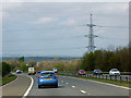 NZ3134 : Powerlines crossing the A1(M) near to Cornforth by David Dixon