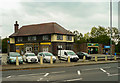 SE2533 : Pub converted to shops, Butt Lane, Bramley by Humphrey Bolton