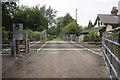 SE6324 : Level crossing on Hanger Lane by Ian S