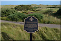 NJ9820 : Plaque at Trump International Golf Links, Scotland  by Andrew Tryon