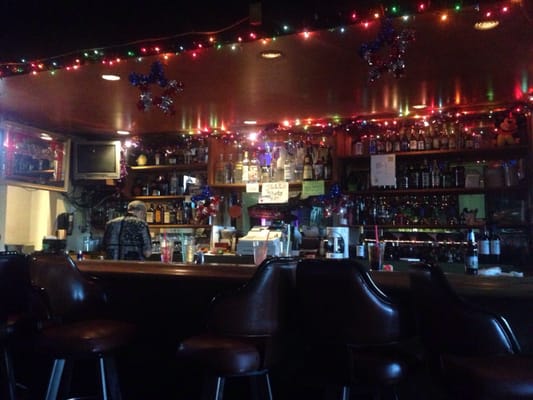 Photo of Gim Wah Restaurant - Seattle, WA, US. a bar with christmas lights