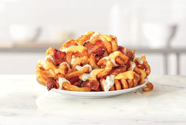 Photo of Arby's - Wabash, IN, US. a plate of pasta with bacon and cheese