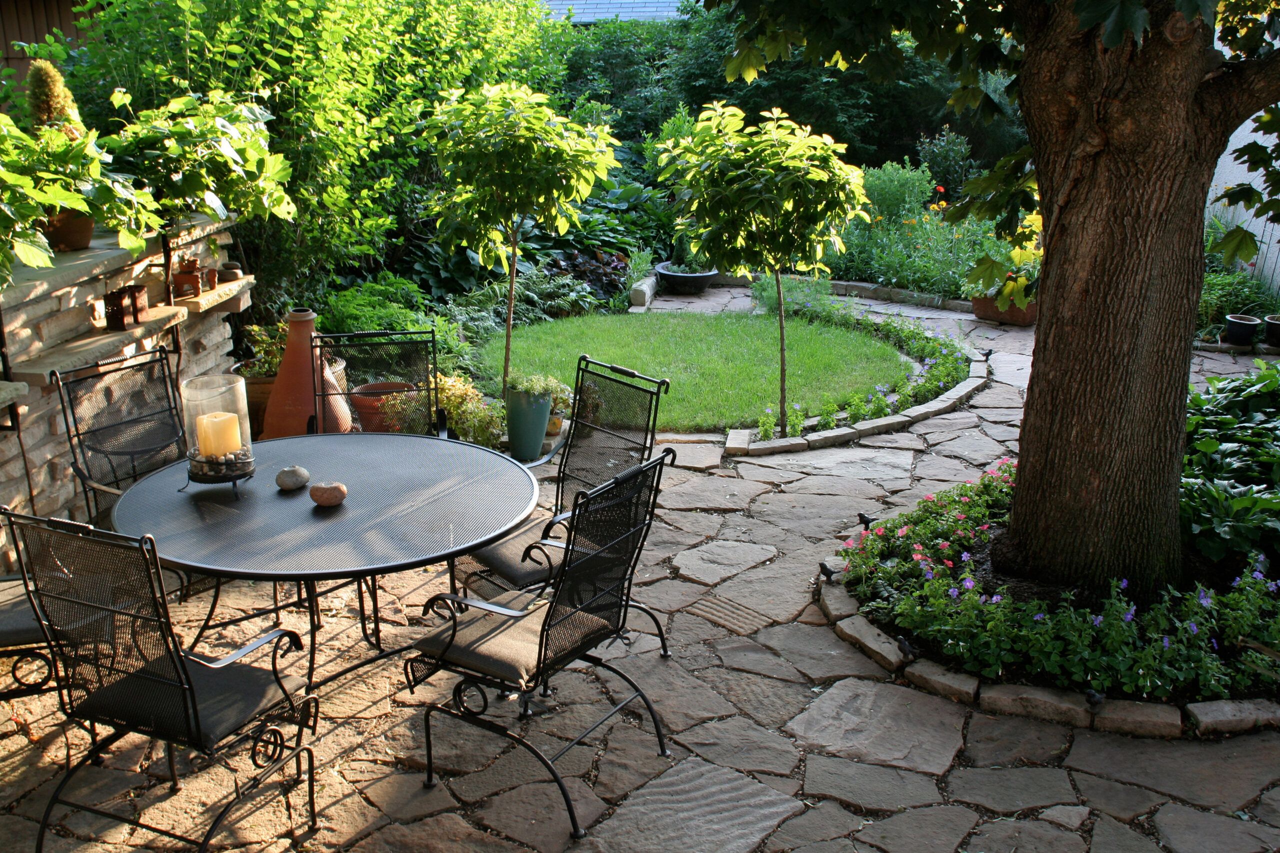 Flagstone landscaping rocks are used to create a patio.