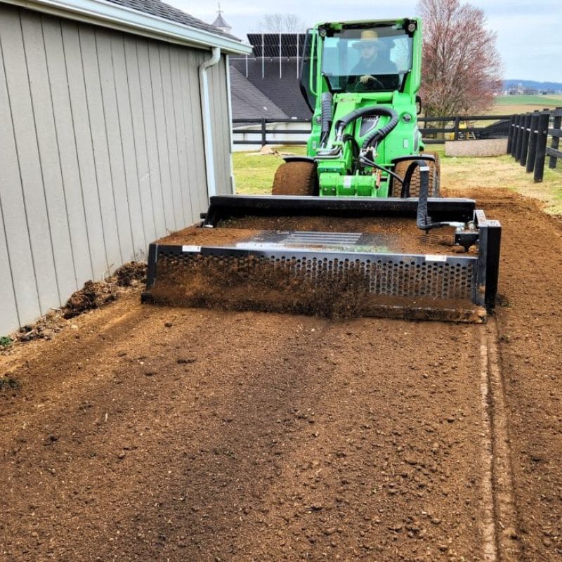 landscape-rock-rake-attachment-in-action