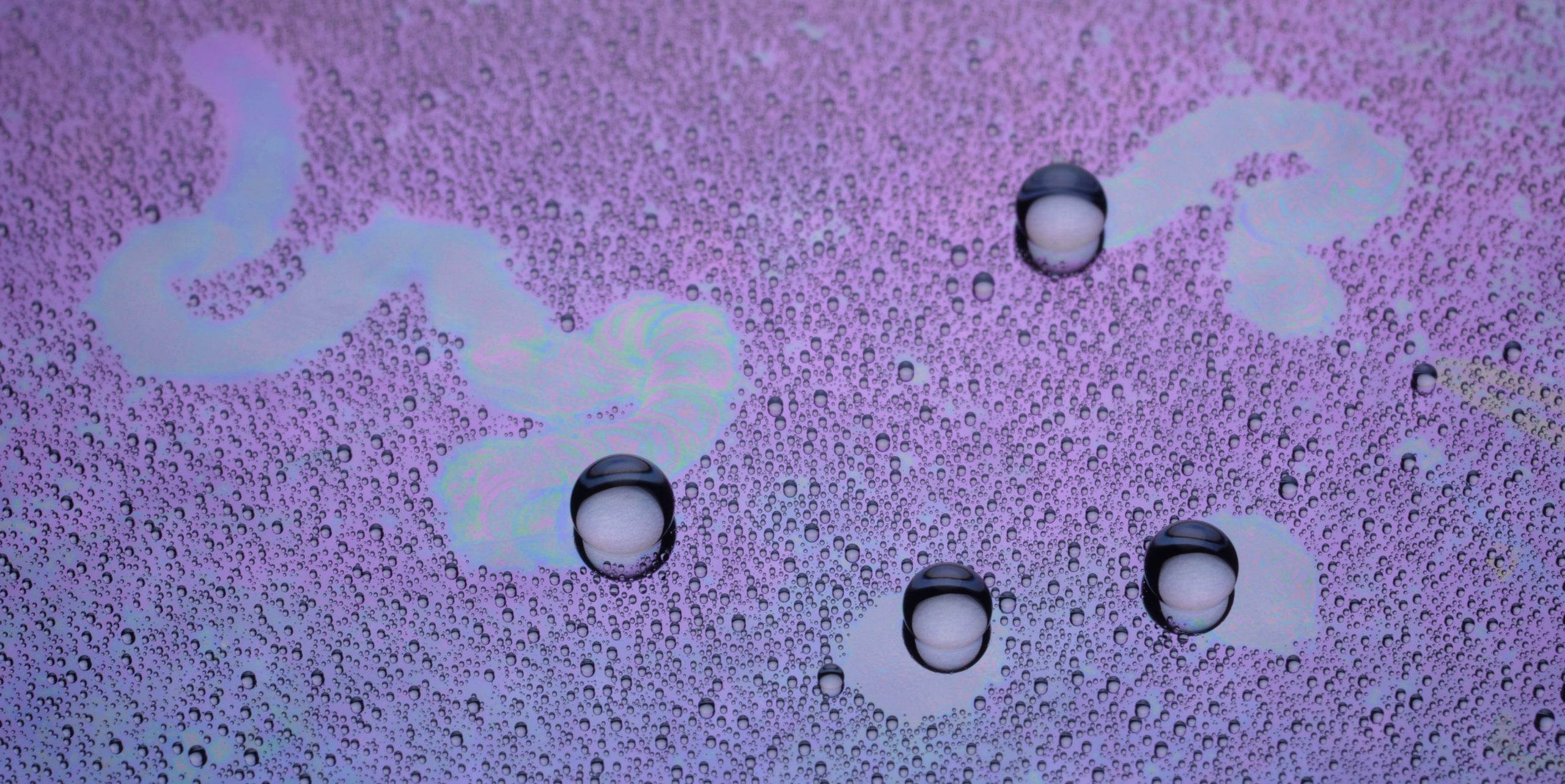 Water-Droplets-Exhibiting-Complex-Collective-Motion-scaled.jpg