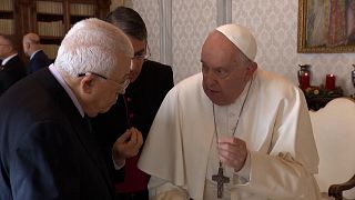 Francis and Abbas speaking during meeting