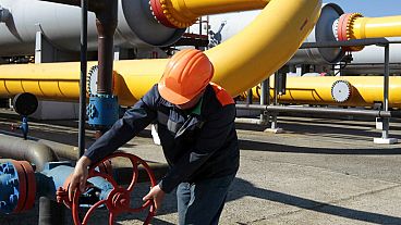 A Ukrainian worker operates valves in a gas storage point in Bil 'che-Volicko-Ugerske underground gas storage facilities in Strij, outside Lviv, Ukraine, May 21, 2014