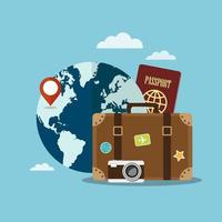 Suitcase and travel items in front of world vector