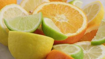 Variety of fresh sliced citrus fruits.  Orange, Lemon, Lime. video