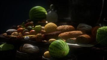 food table with wine barrels and some fruits, vegetables and bread video