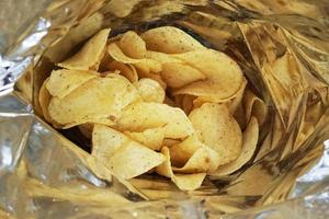 bag of potato chips or packet of crisps photo