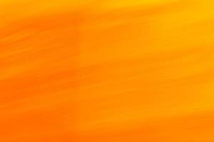 Abstract backdrop background in orange yellow tones with gradient, small waves and lines. photo