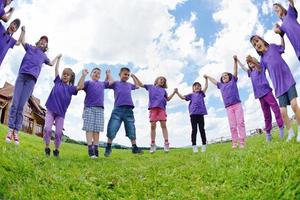 happy kids group  have fun in nature photo