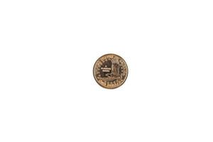 One dollar gold coin. white isolated background. photo