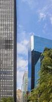 Skyscraper with glass facade in close up picture photo