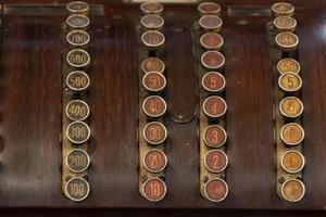 old ancient wood cash register photo