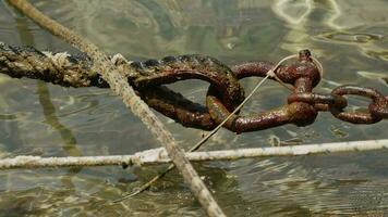 Rusty Mossy Iron Chain Detail Holding Boat video