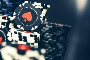 Poker Chips Stacked On Casino Table. photo