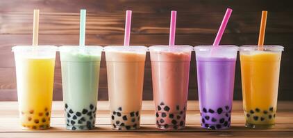 AI generated Plastic cups of different tasty bubble tea on wooden background. Generative AI photo