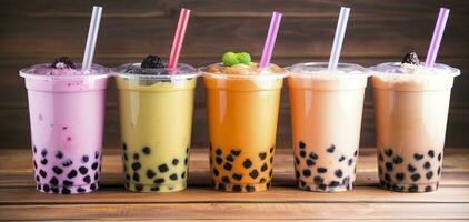 AI generated Plastic cups of different tasty bubble tea on wooden background. Generative AI photo