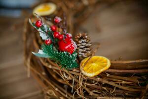 Christmas decoration on the wooden background. Selective focus. Holiday. photo