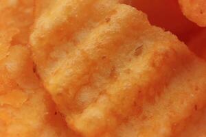 Chips macro closeup background. Fried potato recipe. Snack. Food photo