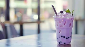 Summer cold cup of refreshing purple bubble tea photo