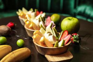 Table Set With Assorted Fruit Bowls photo