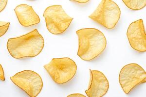 Crispy Potato Chips Scattered on White Background photo